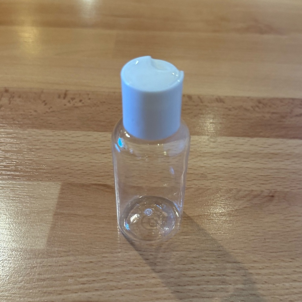 Clear Skincare Bottle with White Cap